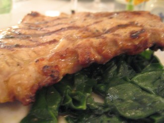 Veal Chop served with wilted spinach